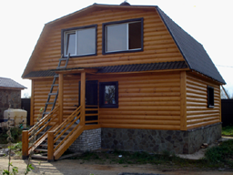 дом из бруса с отделкой блокхаусом